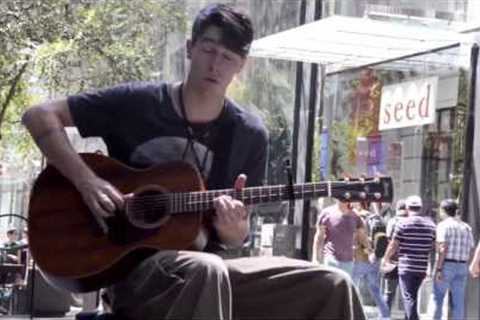 Epic Guitar Player. Awesome Street Performer
