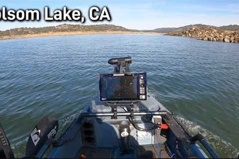 Winter kayak bass fishing on an extremely low lake
