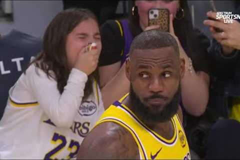 Young fan overcome by emotion by seeing LeBron James close up | NBA on ESPN