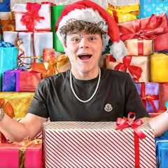 WORLDS CRAZIEST CHRISTMAS GIFTS OPENING! ($500,000)