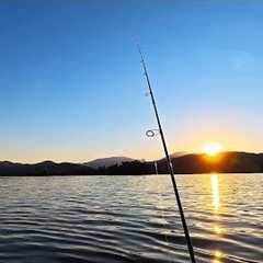 Fishing Lake Buffalo At Sunset