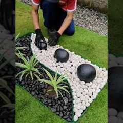 Low Maintenance Garden Design using black and white Pebbles and Rocks #gardenideas #diy #landscape