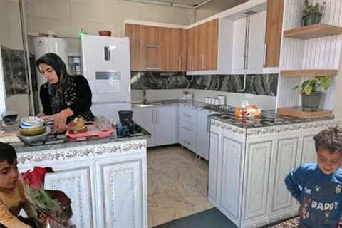 At the end of the year, Tayebeh, who is a single mother, installs the cabinet at home