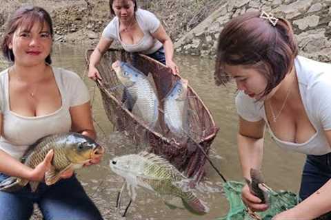 When the lake water recedes, the girl has the opportunity to block the stream to catch fish to sell.
