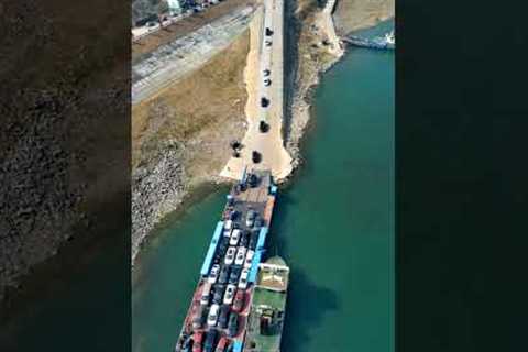 Aerial photography of the Yangtze River car ferry queuing across the river. Picturesque places. Dif