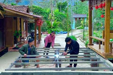 Start the journey to expand the wooden CABIN. The welder came to help build the iron floor frame