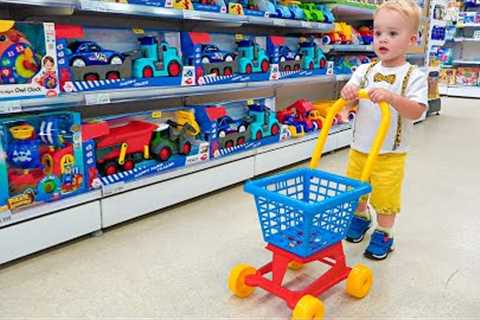 Chris and mom doing shopping in Toy store