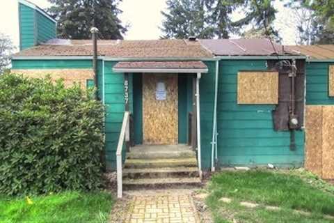 Flip this house!  Boarded up Seattle home up for sale at $450k