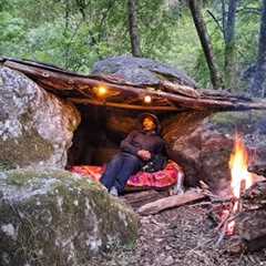 Bushcraft camping, building a survival shelter in the wilderness