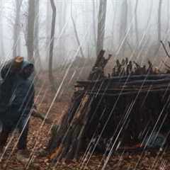 Building a Warm and Cozy NEST | Bushcraft skills , Survival shelter, heavy rain forest , rain storm