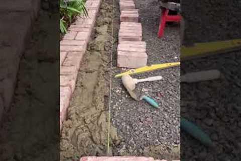 Paving patio with recycled red bricks.  #garden #landscaping #landscape  #paving #diy