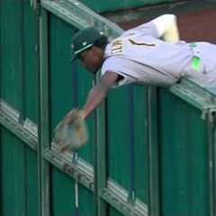 CATCH OF THE YEAR⁉️ Denzel Clarke CLIMBS THE WALL for the HOME RUN ROBBERY 🤯 | ESPN MLB