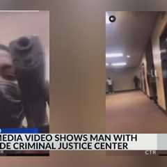 Social media video shows man with gun inside Criminal Justice Center