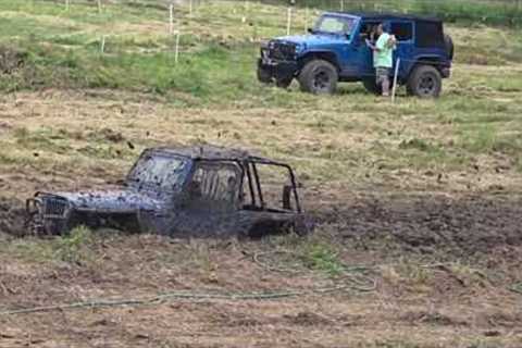 Rob from Wilson home mortgage trying the mud pit at bantam jeep festival 2025