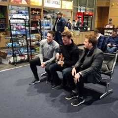 Frustrated, delayed passengers get a surprise by The Gentlemen Trio (GENTRI) in Kansas City Airport