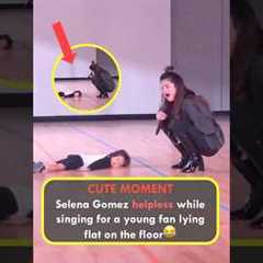 CUTE MOMENT: Selena Gomez helpless while singing for a young fan lying flat on the floor