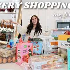 come GROCERY SHOPPING with me *for my new apartment* + haul and organizing my kitchen