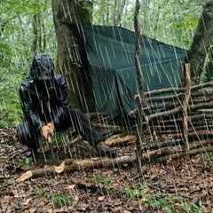 Bushcraft in Heavy Rain – Building Shelter, Fire Wall & Survival Skills
