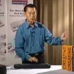 Asian Guy Plays Drums On A Keyboard