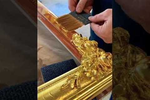 Laying gold leaf on a handmade frame #woodcarving #satisfying #art #gilding #gold #restoration #wood