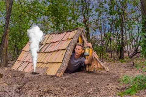 Building a cozy survival shelter. Warm stove, wooden shingles.Bushcraft,Survival Skills.