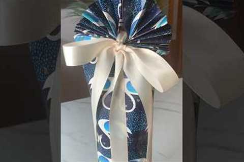 How to Wrap a Bottle 🍾#giftwrapping #giftwrappingideas  #giftwrappinghacks #diy #howto #shorts