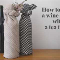 How to wrap a wine bottle with a tea towel (kitchen towel/dish towel) - reusable gift wrapping idea!