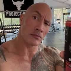The Rock shows his drink and does the eyebrow raise 🤨🥤