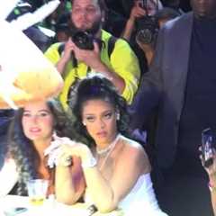 Rihanna flips off model