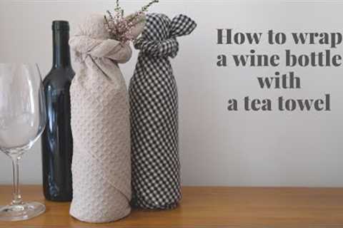How to wrap a wine bottle with a tea towel (kitchen towel/dish towel) - reusable gift wrapping idea!