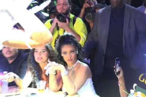 Rihanna flips off model