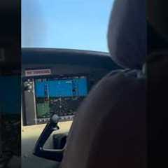 Sitting Behind Pilot Landing In African Island For Dive Trip