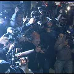 Rihanna gets mobbed by 40 paparazzi at LAX airport