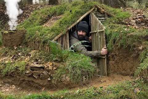 Building complete and warm survival shelter | Bushcraft earth hut, grass roof &amp; fireplace with..