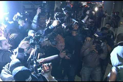 Rihanna gets mobbed by 40 paparazzi at LAX airport