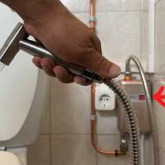 A plumber shows how to connect a toilet shower to amazing mini electric water heater