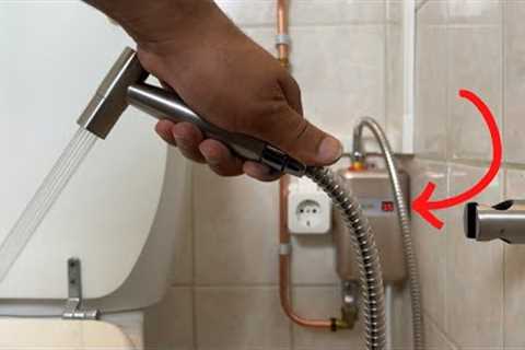 A plumber shows how to connect a toilet shower to amazing mini electric water heater