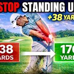 How to Stay Down Through Impact in The Golf Swing