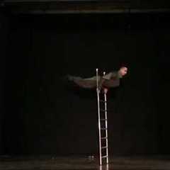 Circus Performer on the Free Standing Ladder j11LW2170726