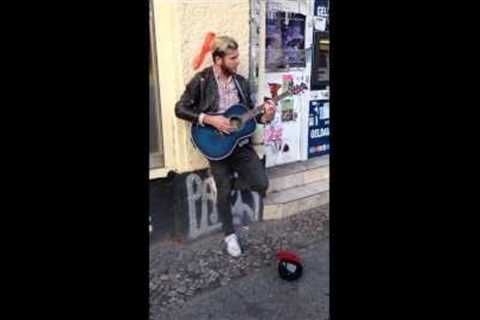 Streetmusician sings - Original singer comes along and joins him