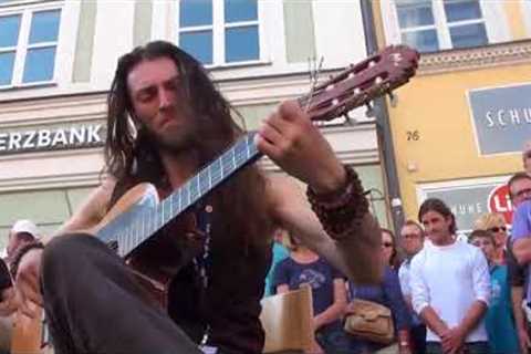 Best Street Guitar Performance Hundreds flock to watch this street performer and you can see why!