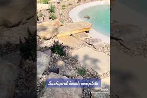 Backyard beach pool is complete! #biodesignpools #VIVID #landscape #indiana