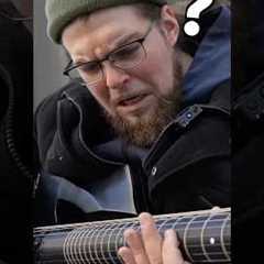 Street musician can’t believe the guitar I just handed him