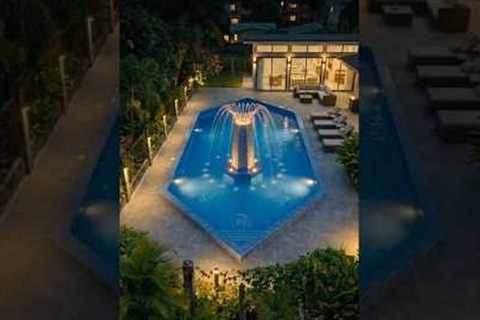 Building a modern resort pool with fountain.
