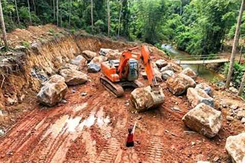 High Power Excavator Breaking Massive Rocks, Building A New House On A Steep Mountainside