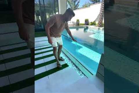 Is this an in-ground or above-ground pool? 👀#luxuryhome #backyard #luxurypools #abovegroundpools