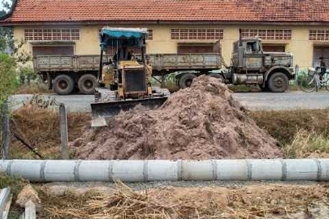 Clearing rice fields to add new land to build a new house dream