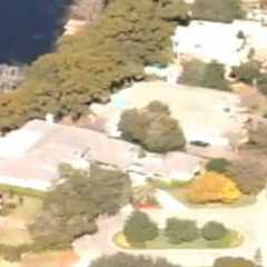 021810 Paparazzi check out Tiger Woods House on helicopter Alequin
