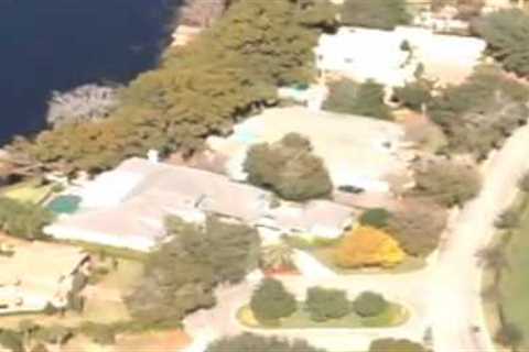 021810 Paparazzi check out Tiger Woods House on helicopter Alequin